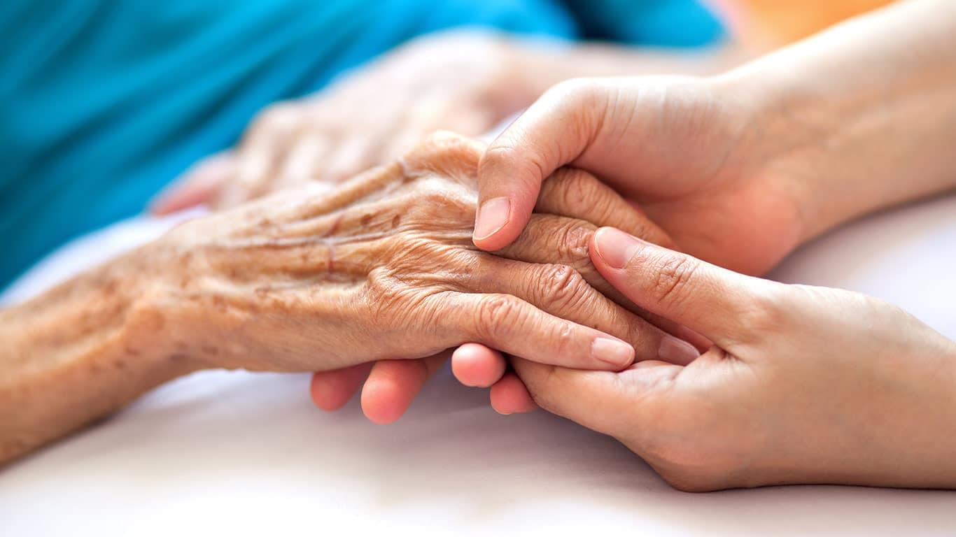 A Young Hand Holding Old Hand
